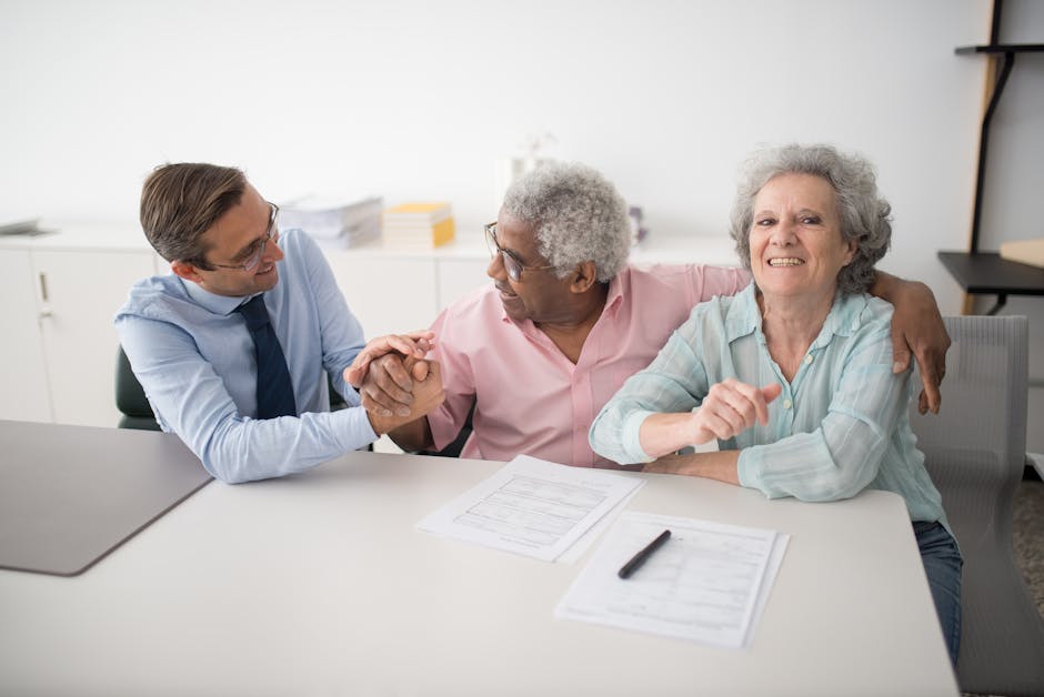 A group of people sitting around a table.