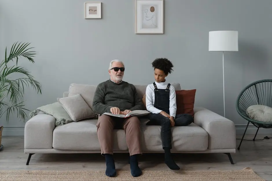 A man and woman sitting on top of a couch.